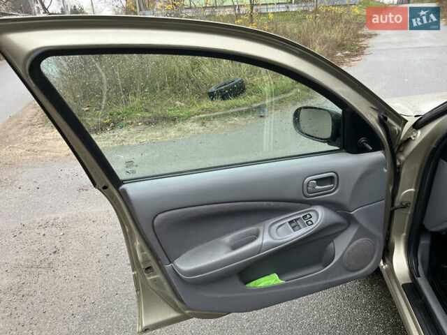 Бежевый Ниссан Альмера, объемом двигателя 1.5 л и пробегом 268 тыс. км за 2799 $, фото 13 на Automoto.ua