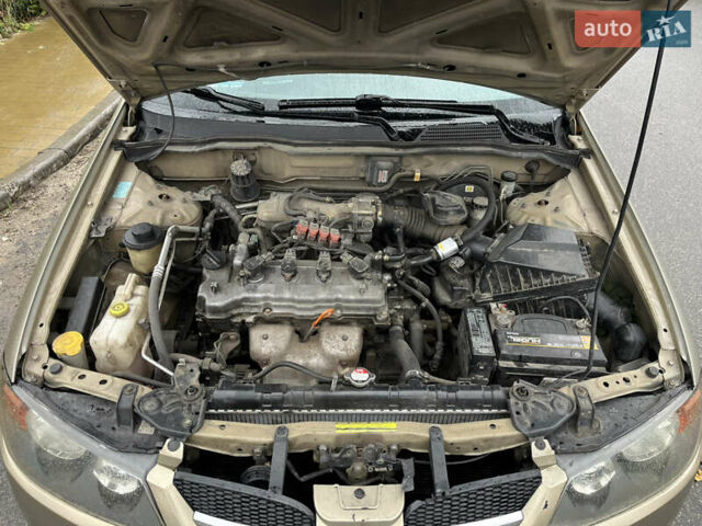 Бежевый Ниссан Альмера, объемом двигателя 1.5 л и пробегом 268 тыс. км за 2799 $, фото 18 на Automoto.ua