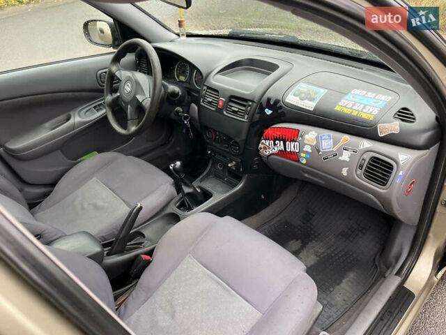 Бежевый Ниссан Альмера, объемом двигателя 1.5 л и пробегом 268 тыс. км за 2799 $, фото 10 на Automoto.ua