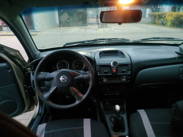 Бежевый Ниссан Альмера, объемом двигателя 1.5 л и пробегом 215 тыс. км за 3200 $, фото 6 на Automoto.ua