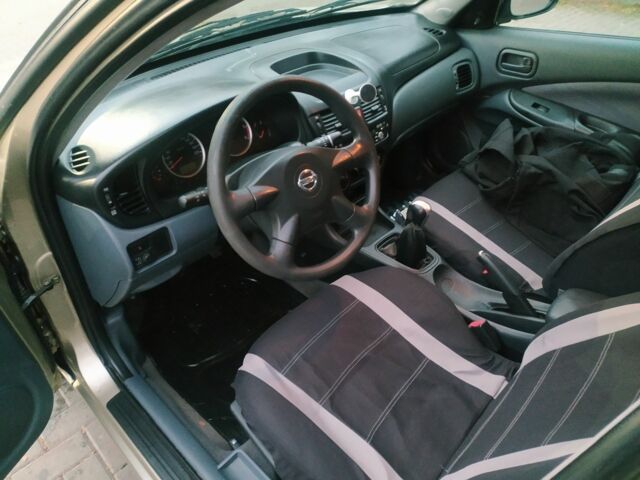 Бежевый Ниссан Альмера, объемом двигателя 1.5 л и пробегом 215 тыс. км за 3200 $, фото 7 на Automoto.ua