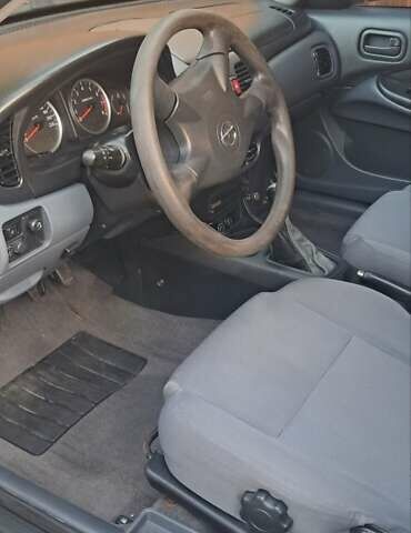 Бежевый Ниссан Альмера, объемом двигателя 1.5 л и пробегом 315 тыс. км за 3100 $, фото 2 на Automoto.ua