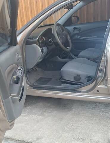 Бежевый Ниссан Альмера, объемом двигателя 1.5 л и пробегом 315 тыс. км за 3100 $, фото 8 на Automoto.ua