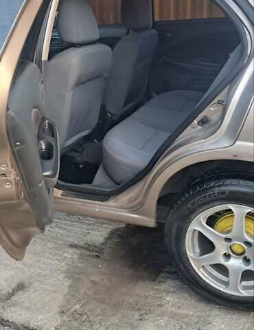 Бежевый Ниссан Альмера, объемом двигателя 1.5 л и пробегом 315 тыс. км за 3100 $, фото 4 на Automoto.ua