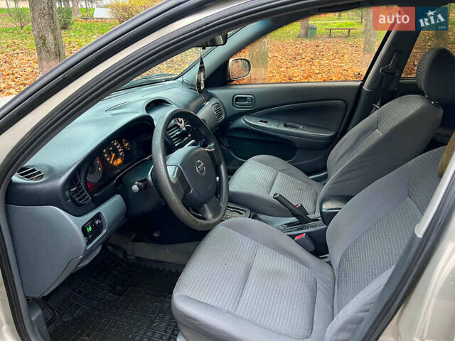 Бежевий Ніссан Альмера, об'ємом двигуна 1.6 л та пробігом 315 тис. км за 4290 $, фото 10 на Automoto.ua