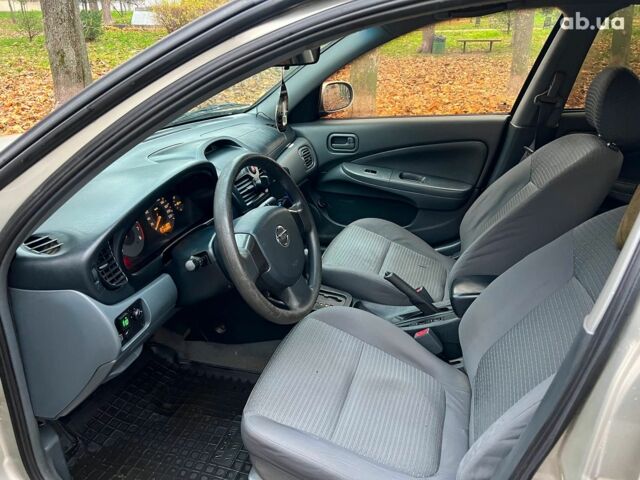 Бежевий Ніссан Альмера, об'ємом двигуна 1.6 л та пробігом 315 тис. км за 4290 $, фото 10 на Automoto.ua