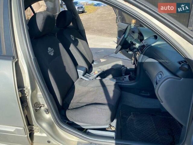 Бежевый Ниссан Альмера, объемом двигателя 1.6 л и пробегом 248 тыс. км за 3990 $, фото 11 на Automoto.ua