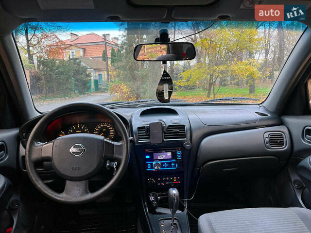 Бежевий Ніссан Альмера, об'ємом двигуна 1.6 л та пробігом 315 тис. км за 4290 $, фото 16 на Automoto.ua