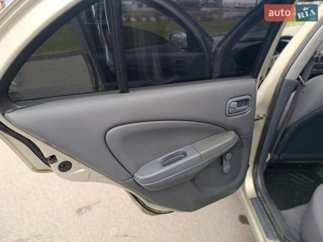 Бежевий Ніссан Альмера, об'ємом двигуна 1.6 л та пробігом 290 тис. км за 4100 $, фото 21 на Automoto.ua