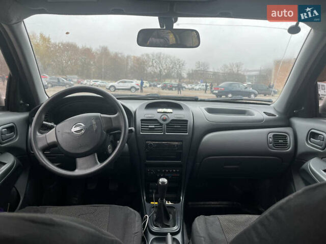 Бежевий Ніссан Альмера, об'ємом двигуна 1.6 л та пробігом 220 тис. км за 3450 $, фото 7 на Automoto.ua