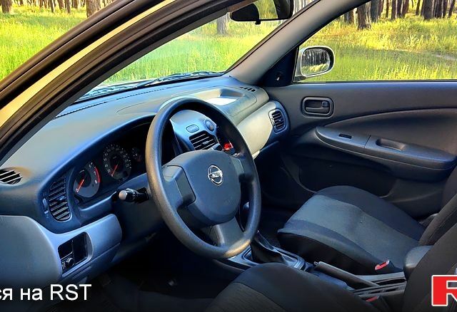 Бежевый Ниссан Альмера, объемом двигателя 1.6 л и пробегом 61 тыс. км за 6700 $, фото 7 на Automoto.ua