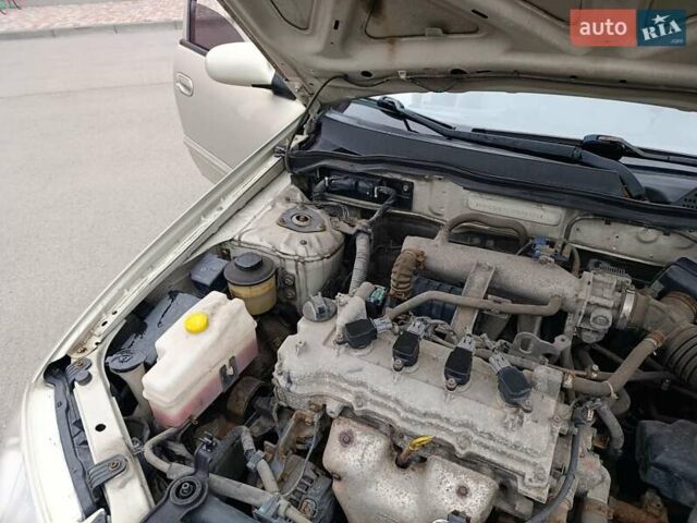 Бежевий Ніссан Альмера, об'ємом двигуна 1.6 л та пробігом 290 тис. км за 4100 $, фото 13 на Automoto.ua