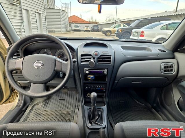 Бежевий Ніссан Альмера, об'ємом двигуна 1.6 л та пробігом 75 тис. км за 4900 $, фото 11 на Automoto.ua