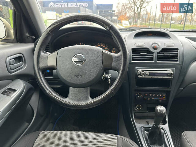 Бежевий Ніссан Альмера, об'ємом двигуна 1.6 л та пробігом 226 тис. км за 4300 $, фото 13 на Automoto.ua