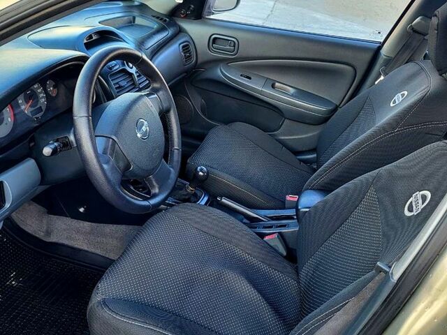 Бежевый Ниссан Альмера, объемом двигателя 1.6 л и пробегом 250 тыс. км за 3600 $, фото 8 на Automoto.ua