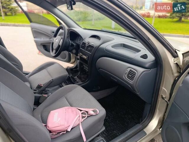 Бежевий Ніссан Альмера, об'ємом двигуна 1.6 л та пробігом 290 тис. км за 4100 $, фото 32 на Automoto.ua