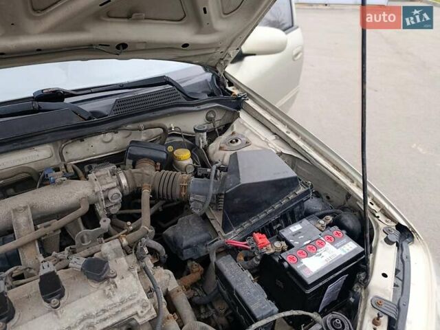 Бежевий Ніссан Альмера, об'ємом двигуна 1.6 л та пробігом 290 тис. км за 4100 $, фото 14 на Automoto.ua