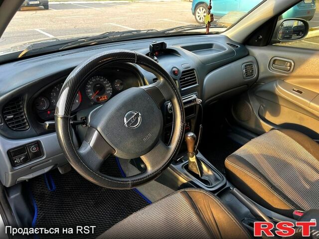 Бежевый Ниссан Альмера, объемом двигателя 1.6 л и пробегом 226 тыс. км за 4100 $, фото 9 на Automoto.ua