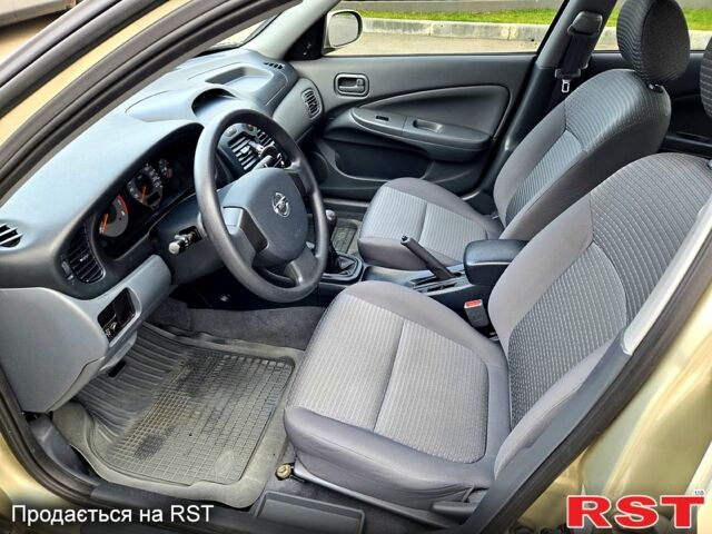 Бежевий Ніссан Альмера, об'ємом двигуна 1.6 л та пробігом 75 тис. км за 4900 $, фото 10 на Automoto.ua