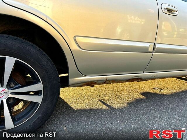 Бежевый Ниссан Альмера, объемом двигателя 1.6 л и пробегом 226 тыс. км за 4100 $, фото 4 на Automoto.ua