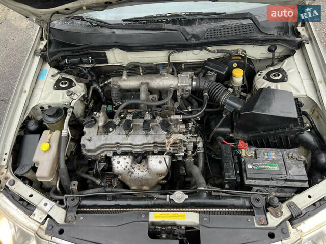 Бежевый Ниссан Альмера, объемом двигателя 1.6 л и пробегом 200 тыс. км за 3400 $, фото 8 на Automoto.ua