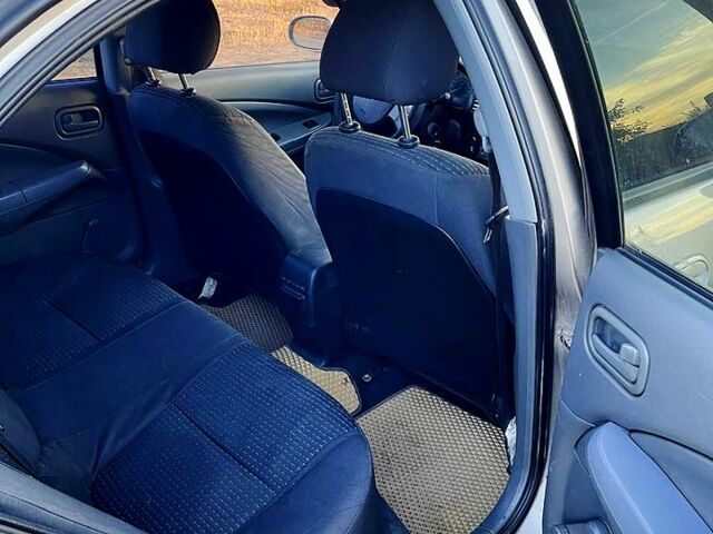 Бежевый Ниссан Альмера, объемом двигателя 1.6 л и пробегом 183 тыс. км за 5300 $, фото 7 на Automoto.ua