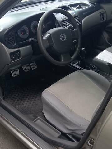 Бежевый Ниссан Альмера, объемом двигателя 1.6 л и пробегом 160 тыс. км за 5400 $, фото 4 на Automoto.ua