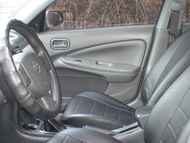 Бежевый Ниссан Альмера, объемом двигателя 1.6 л и пробегом 229 тыс. км за 5000 $, фото 6 на Automoto.ua