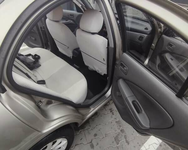 Бежевый Ниссан Альмера, объемом двигателя 1.6 л и пробегом 201 тыс. км за 6700 $, фото 17 на Automoto.ua