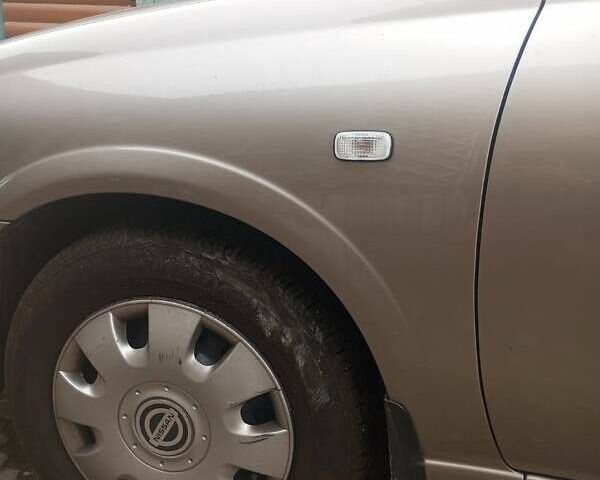 Бежевий Ніссан Альмера, об'ємом двигуна 1.6 л та пробігом 300 тис. км за 4650 $, фото 13 на Automoto.ua