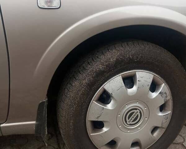 Бежевий Ніссан Альмера, об'ємом двигуна 1.6 л та пробігом 300 тис. км за 4650 $, фото 16 на Automoto.ua