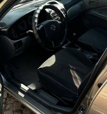 Бежевий Ніссан Альмера, об'ємом двигуна 1.6 л та пробігом 300 тис. км за 4650 $, фото 8 на Automoto.ua