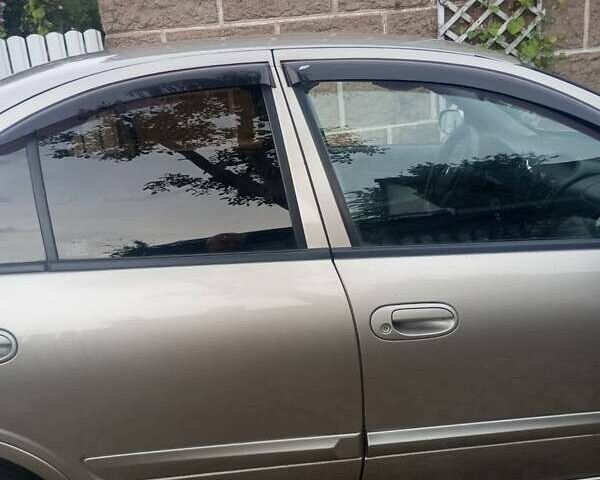 Бежевий Ніссан Альмера, об'ємом двигуна 1.6 л та пробігом 300 тис. км за 4650 $, фото 2 на Automoto.ua