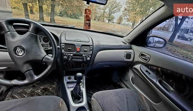 Черный Ниссан Альмера, объемом двигателя 1.5 л и пробегом 243 тыс. км за 2700 $, фото 6 на Automoto.ua