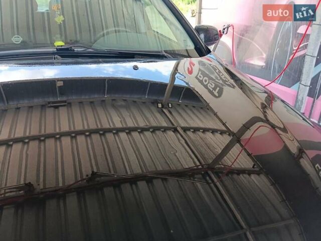 Черный Ниссан Альмера, объемом двигателя 1.5 л и пробегом 435 тыс. км за 2800 $, фото 1 на Automoto.ua