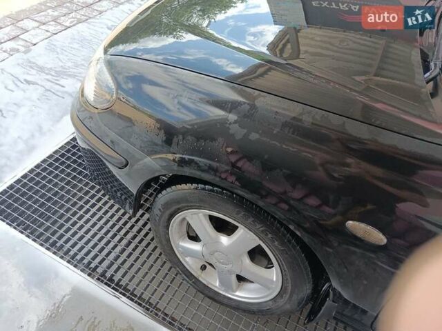 Черный Ниссан Альмера, объемом двигателя 1.5 л и пробегом 435 тыс. км за 2800 $, фото 4 на Automoto.ua