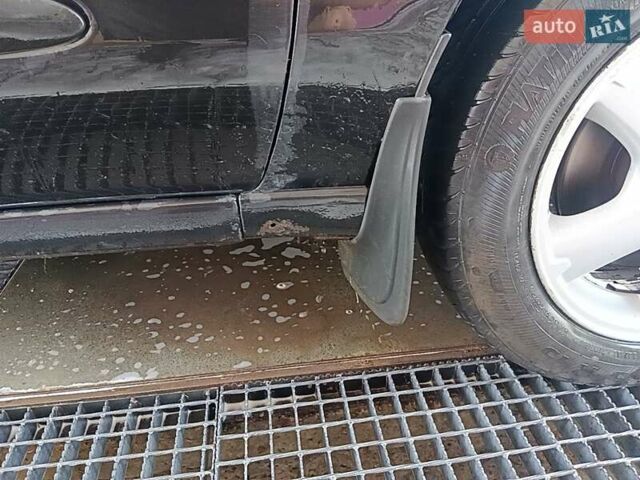 Черный Ниссан Альмера, объемом двигателя 1.5 л и пробегом 435 тыс. км за 2800 $, фото 12 на Automoto.ua