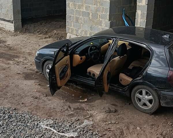 Черный Ниссан Альмера, объемом двигателя 1.5 л и пробегом 435 тыс. км за 2800 $, фото 5 на Automoto.ua