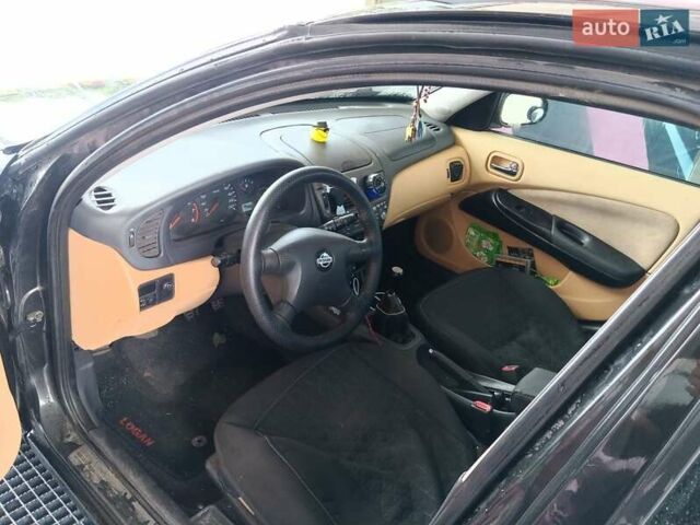 Черный Ниссан Альмера, объемом двигателя 1.5 л и пробегом 435 тыс. км за 2800 $, фото 21 на Automoto.ua