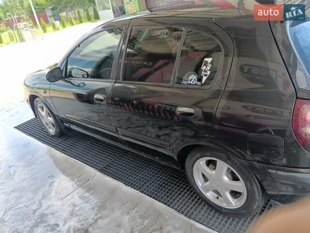 Черный Ниссан Альмера, объемом двигателя 1.5 л и пробегом 435 тыс. км за 2800 $, фото 7 на Automoto.ua