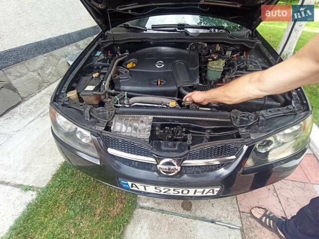 Черный Ниссан Альмера, объемом двигателя 1.5 л и пробегом 222 тыс. км за 5000 $, фото 9 на Automoto.ua
