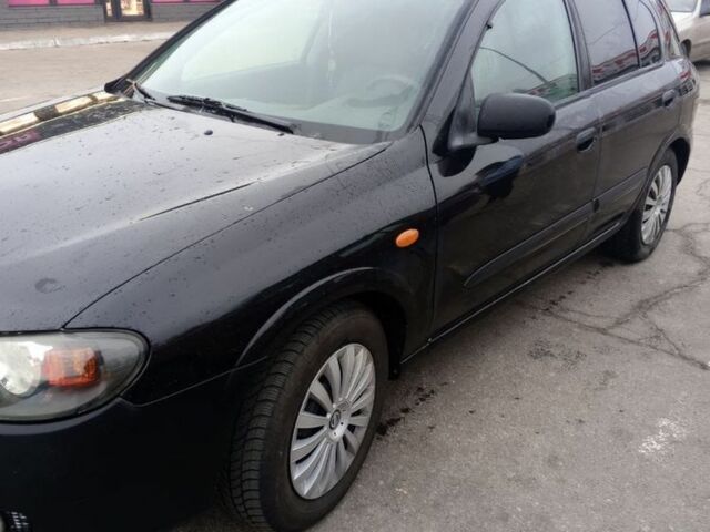 Черный Ниссан Альмера, объемом двигателя 1.5 л и пробегом 200 тыс. км за 3850 $, фото 1 на Automoto.ua