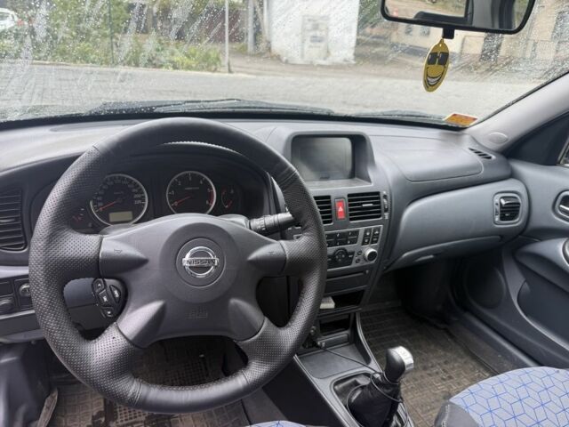Чорний Ніссан Альмера, об'ємом двигуна 1.5 л та пробігом 183 тис. км за 3950 $, фото 6 на Automoto.ua