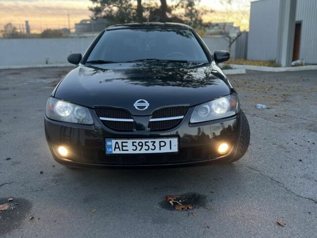 Черный Ниссан Альмера, объемом двигателя 1.5 л и пробегом 322 тыс. км за 3050 $, фото 1 на Automoto.ua