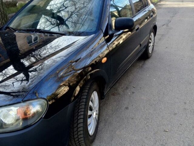 Черный Ниссан Альмера, объемом двигателя 1.5 л и пробегом 200 тыс. км за 3850 $, фото 2 на Automoto.ua