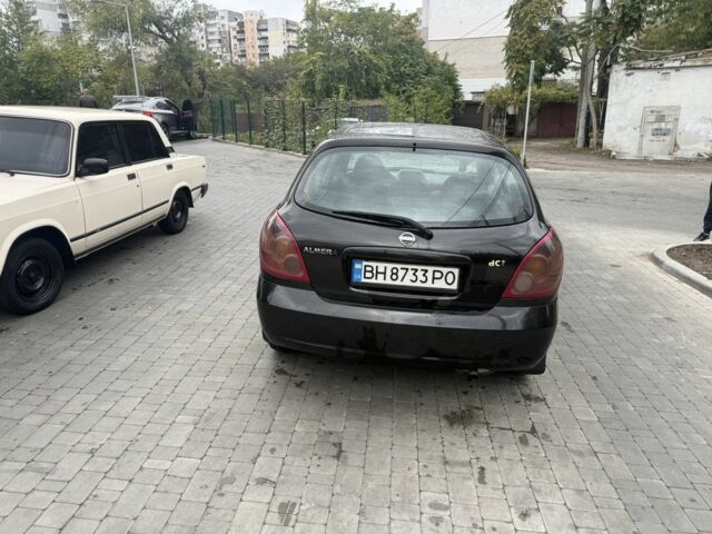 Чорний Ніссан Альмера, об'ємом двигуна 1.5 л та пробігом 183 тис. км за 3950 $, фото 4 на Automoto.ua