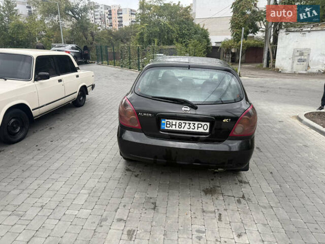 Чорний Ніссан Альмера, об'ємом двигуна 1.5 л та пробігом 183 тис. км за 3950 $, фото 4 на Automoto.ua