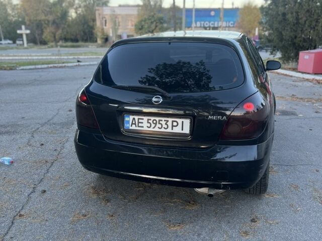 Черный Ниссан Альмера, объемом двигателя 1.5 л и пробегом 322 тыс. км за 3050 $, фото 3 на Automoto.ua