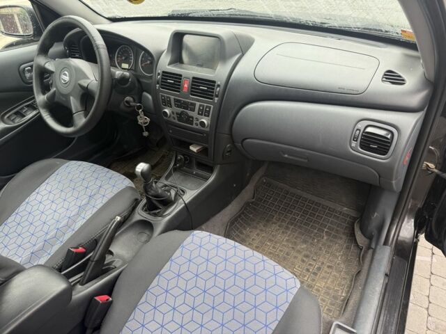 Чорний Ніссан Альмера, об'ємом двигуна 1.5 л та пробігом 183 тис. км за 3950 $, фото 7 на Automoto.ua