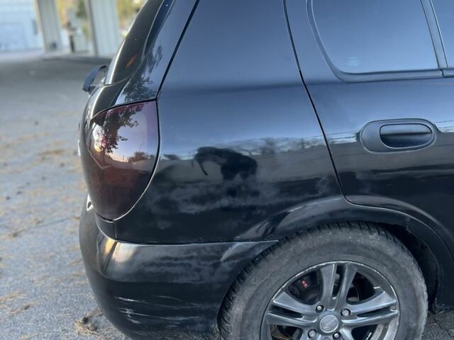 Черный Ниссан Альмера, объемом двигателя 1.5 л и пробегом 322 тыс. км за 3050 $, фото 6 на Automoto.ua